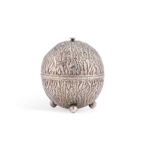 338 - AN EGYPTIAN SILVER STRING BOX unmarked, globular with three ball feet, densely chased with pharaohs,... 