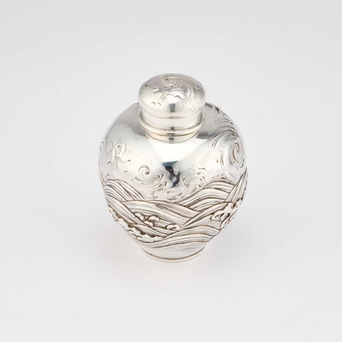 343 - A JAPANESE SILVER TEA CADDY signed and stamped 950, boldly chased with a qilin amidst waves. 10cm hi... 