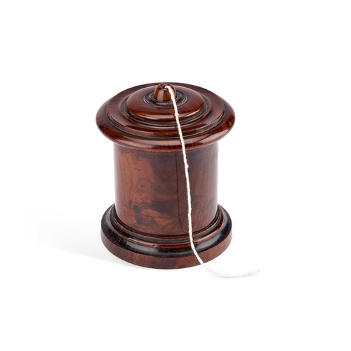 37 - A 19TH CENTURY LIGNUM VITAE STRING BOX cylindrical form. 13cm high