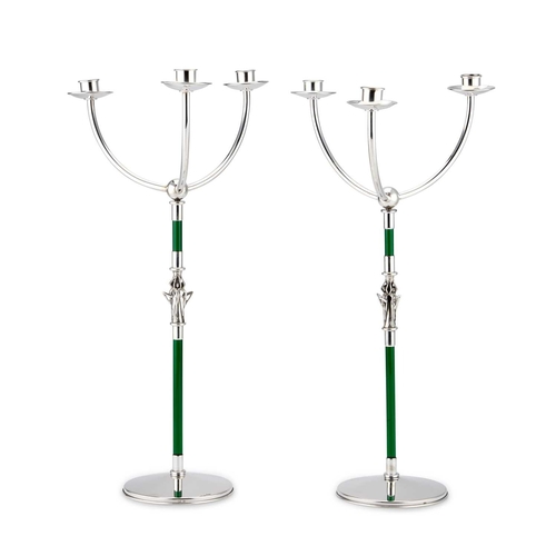 379 - A PAIR OF ITALIAN SILVER AND GLASS CANDELABRA by Ottaviani, each with three lights above a green gla... 