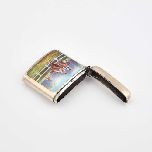 386 - A GERMAN SILVER AND ENAMEL VESTA CASE stamped '935', of rounded rectangular form, shaped for the poc... 