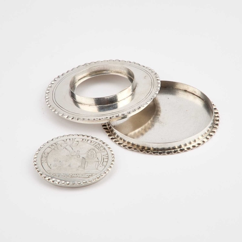 387 - A DUTCH SILVER PYX OR HOST BOX of flattened circular form with a double-opening lid. 8cm diameter, 2... 