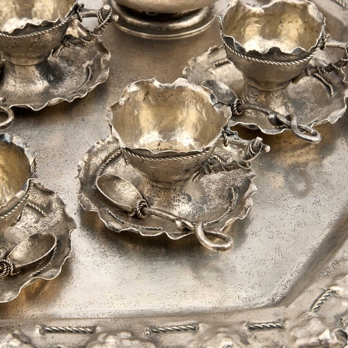 389 - Â§ AN AUSTRO-HUNGARIAN SILVER COFFEE SERVICE by BrÃ¼der Frank, Vienna, c.1900, in a rusticated tromp... 