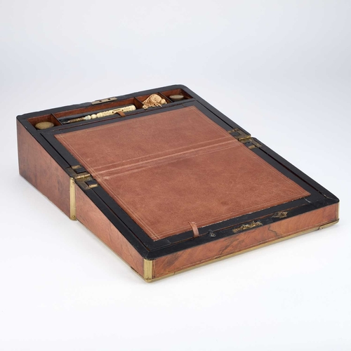 39 - A MID-19TH CENTURY BRASS-BOUND BURR WALNUT WRITING SLOPE the fitted interior housing a Victorian car... 