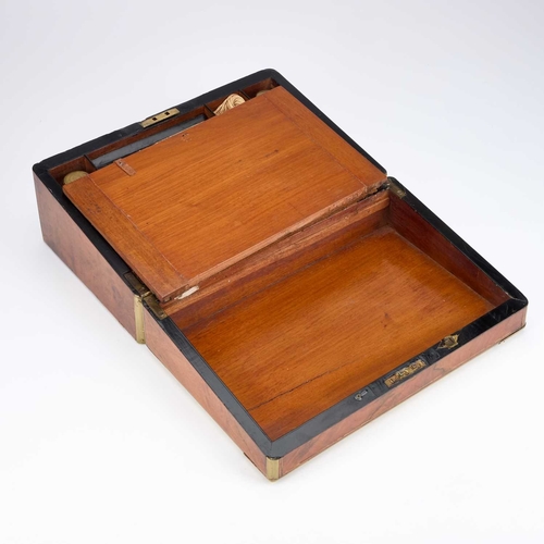 39 - A MID-19TH CENTURY BRASS-BOUND BURR WALNUT WRITING SLOPE the fitted interior housing a Victorian car... 