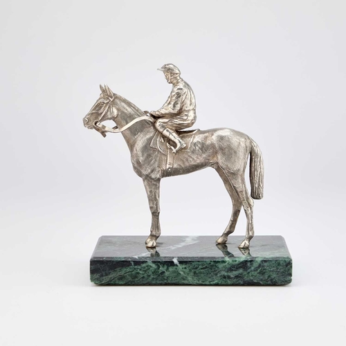 409 - AN ELIZABETH II SILVER MODEL OF A MOUNTED JOCKEY maker's mark illegible, London 1985, realistically ... 