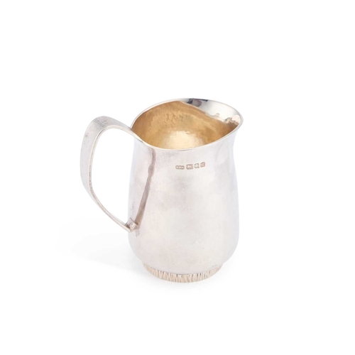 411 - AN ELIZABETH II SILVER CREAM JUG by Anthony Paton Hawksley, London 1991, designed for Payne-Oxford, ... 