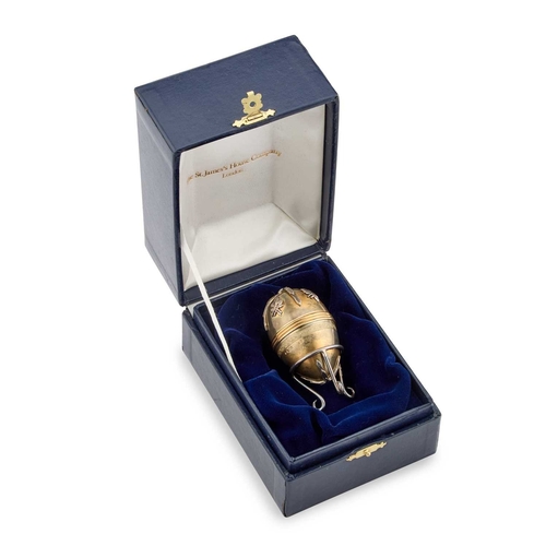 425 - A FABERGÃ STYLE PARCEL-GILT SILVER EGG by St James House Company, London 1982, the egg-shaped box o... 