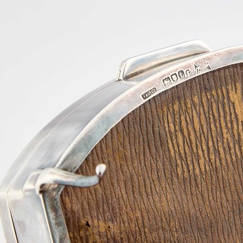 435 - A GEORGE V SILVER JEWELLERY BOX by Asprey & Co Ltd, London 1914, oval with flat sides, raised on... 