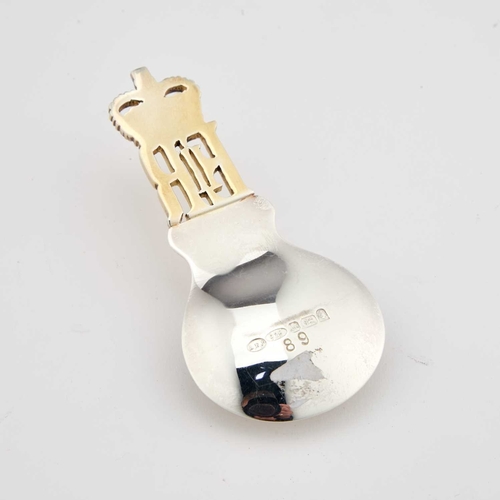 441 - AN ELIZABETH II COMMEMORATIVE GOLDEN JUBILEE SILVER-GILT CADDY SPOON by Albert Edward Jones, Birming... 