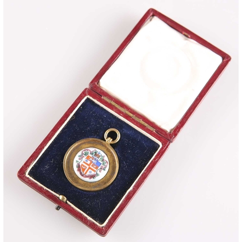 445 - A GEORGE V SILVER-GILT AND ENAMEL 'HARROGATE' FOB MEDALLION by Vaughton & Sons, Birmingham 1912,... 