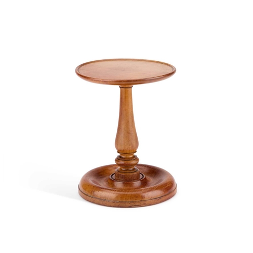 47 - AN EARLY 19TH CENTURY TREEN CANDLESTAND, BY EDMUND NYE with a weighted circular base, remains of tra... 