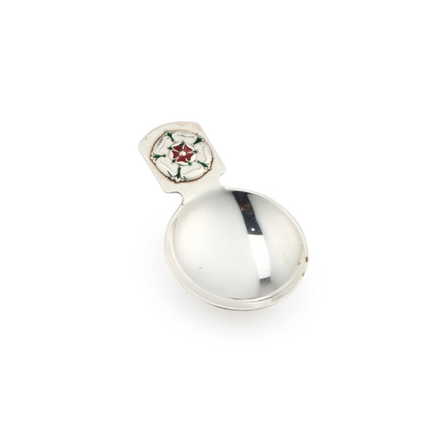 471 - AN ELIZABETH II SILVER AND ENAMEL CADDY SPOON by Turner & Simpson, Birmingham 1976, with an enam... 