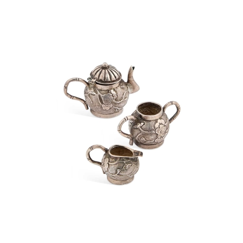 484 - AN EARLY 20TH CENTURY NOVELTY CHINESE EXPORT SILVER MINIATURE THREE-PIECE TEA SET unmarked, comprisi... 