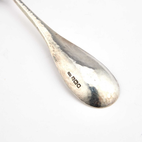 502 - AN ARTS AND CRAFTS SILVER PORRINGER SPOON by C.R. Ashby, Guild of Handicrafts, London 1901, the elon... 