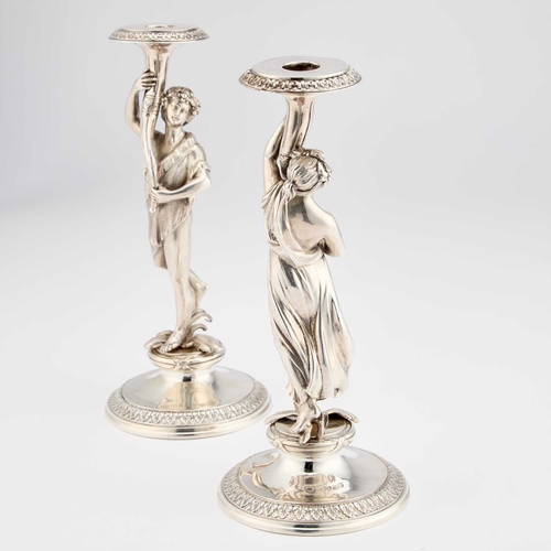 522 - A PAIR OF VICTORIAN SILVER FIGURAL CANDLESTICKS by S Smith & Son, London 1865, cast as a Bacchic... 