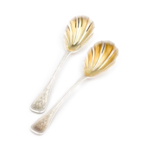 531 - A PAIR OF VICTORIAN SILVER SERVING SPOONS by Francis Higgins II, London 1858, each with gilded shell... 