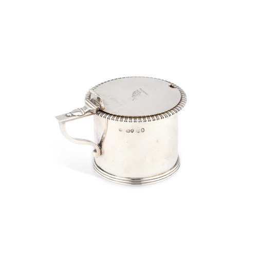 534 - A GEORGE IV SILVER MUSTARD POT by Thomas and George Hayter, London 1824, of typical form with a gadr... 