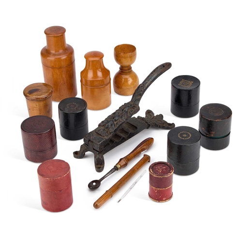 55 - A GROUP OF APOTHECARY TREEN AND A CAST IRON APOTHECARY CORK PRESS including two boxwood apothecary b... 