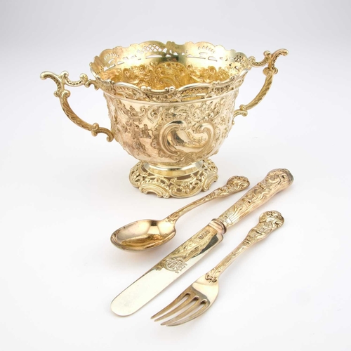 560 - A FINE VICTORIAN SILVER-GILT CASED SET COMPRISING TWO-HANDLED BOWL, FORK, SPOON AND KNIFE the bowl, ... 