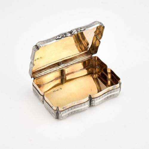 574 - A VICTORIAN SILVER SNUFF BOX by Nathaniel Mills, Birmingham 1846, of shaped rectangular form, engine... 