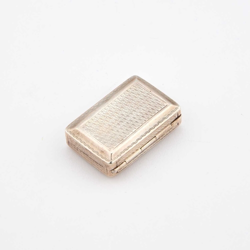 580 - A GEORGE IV SILVER VINAIGRETTE by John Bettridge, Birmingham 1824, rectangular, engine-turned, the i... 