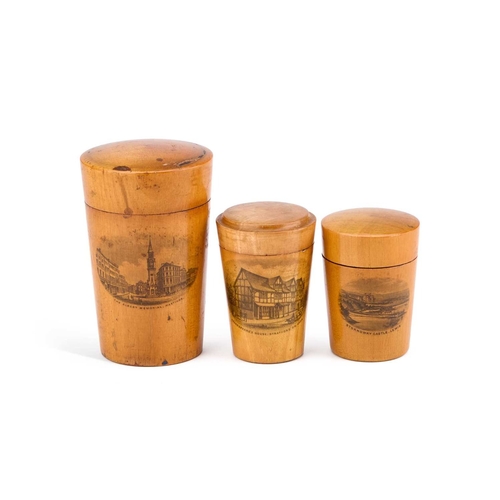 60 - THREE MAUCHLINE WARE GLASS HOLDERS each decorated with a titled and printed scene. (3) Tallest 10.5c... 