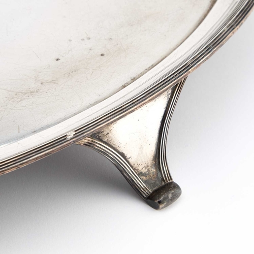 625 - A GEORGE III SILVER SALVER by Peter & Ann Bateman, London 1792, oval, with a reeded edge, engrav... 