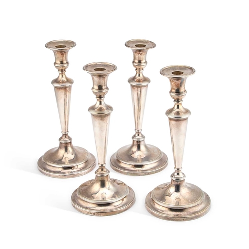 631 - A SET OF FOUR GEORGE III SILVER CANDLESTICKS by John Green, Roberts, Mosley & Co, Sheffield 1802... 