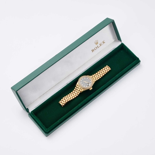 655 - A LADY'S 18CT GOLD ROLEX OYSTER BRACELET WATCH the circular black dial signed Rolex Oyster Perpetual... 