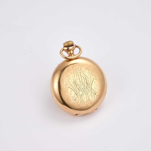 667 - A 14K GOLD WALTHAM HUNTER POCKET WATCH the circular white enamel dial signed Waltham, with black Rom... 