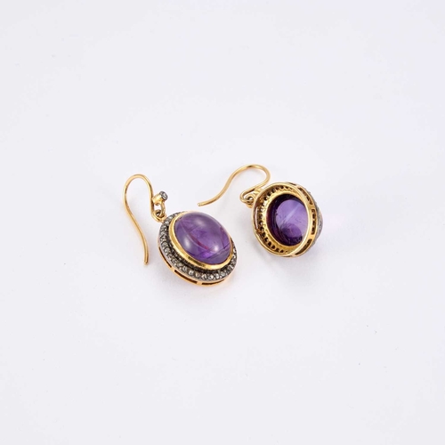 728 - A PAIR OF SILVER-GILT CABOCHON AMETHYST AND ROSE-CUT DIAMOND PENDANT EARRINGS oval cabochon amethyst... 