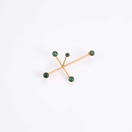 751 - AN EARLY 20TH CENTURY GREEN TOURMALINE SOUTHERN STAR CONSTELLATION BROOCH stamped '15CT'. 3.8cm by 5... 