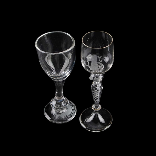 776 - AN AIR TWIST WINE GLASS the bowl etched with a tower and letter S; together with a heavy wine glass ... 