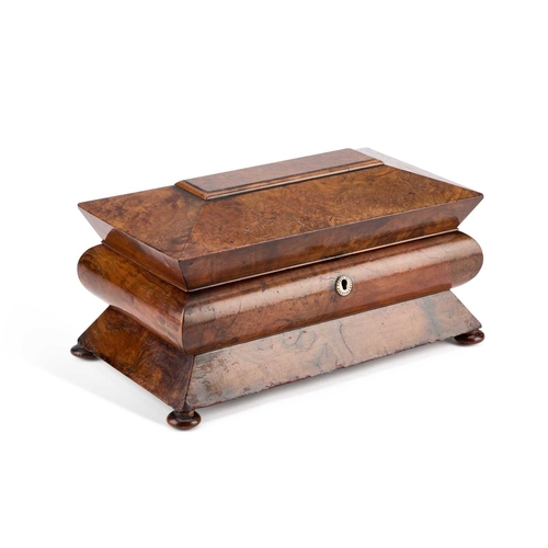 79 - A WILLIAM IV BURR WALNUT TEA CADDY of large proportions, bombe form with bun feet, the interior with... 