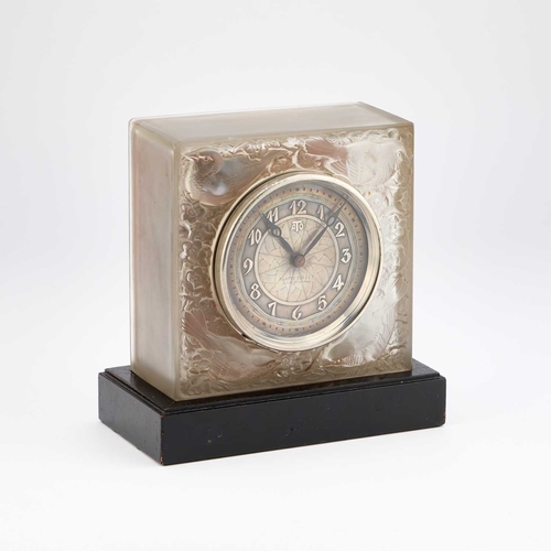 799 - RENÃ LALIQUE (FRENCH, 1860-1945), 'QUATRE MOINEAUX DU JAPON', AN OPALESCENT GLASS CLOCK designed 19... 