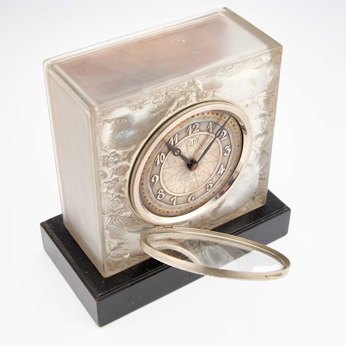 799 - RENÃ LALIQUE (FRENCH, 1860-1945), 'QUATRE MOINEAUX DU JAPON', AN OPALESCENT GLASS CLOCK designed 19... 