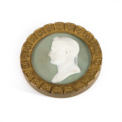 836 - A 19TH CENTURY BISCUIT PORCELAIN PORTRAIT MEDALLION DEPICTING NAPOLEON in a gilt-metal frame with ca... 