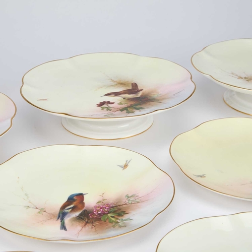 857 - A ROYAL WORCESTER DESSERT SERVICE comprising three comports and six plates, each painted with a perc... 