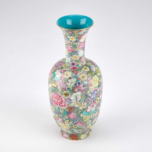 900 - A CHINESE FAMILLE ROSE MILLEFLEUR VASE decorated overall with a dense multitude of flower sprays, be... 