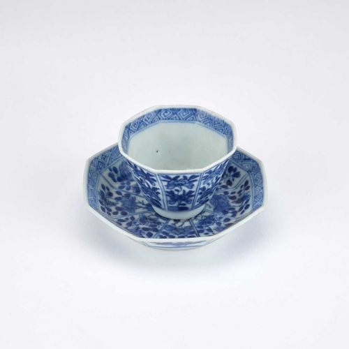 904 - A CHINESE VUNG TAO CARGO BLUE AND WHITE CUP AND SAUCER each of octagonal form, painted with panels o... 