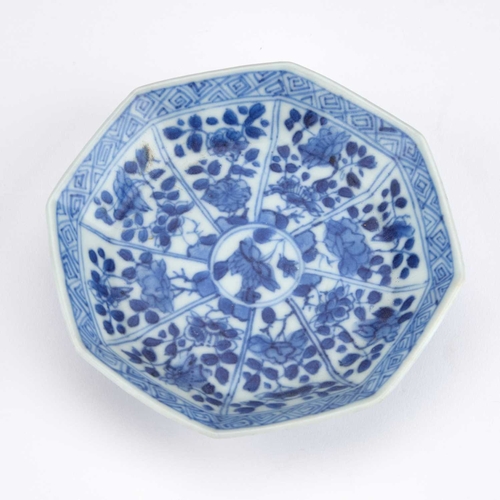 904 - A CHINESE VUNG TAO CARGO BLUE AND WHITE CUP AND SAUCER each of octagonal form, painted with panels o... 