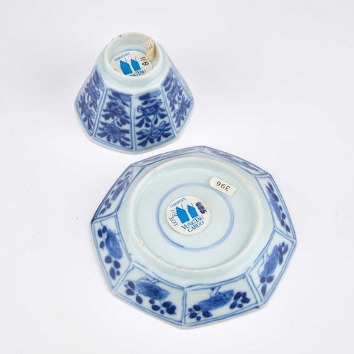 904 - A CHINESE VUNG TAO CARGO BLUE AND WHITE CUP AND SAUCER each of octagonal form, painted with panels o... 