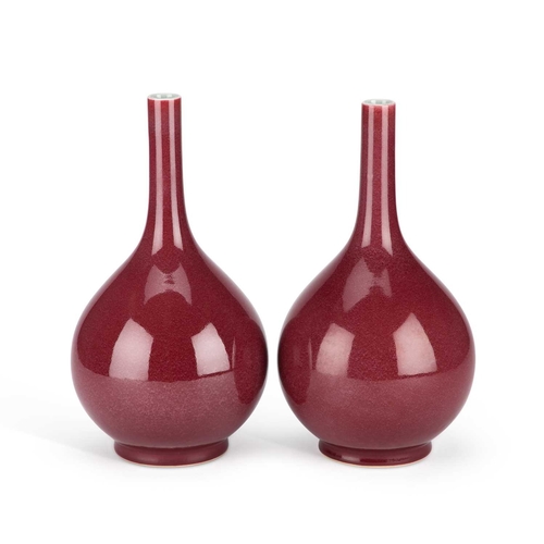 909 - A PAIR OF CHINESE LANGYAO VASES with slender necks and bulbous bodies. (2) 33cm high