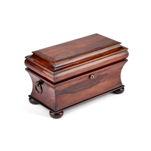 91 - A GEORGE IV ROSEWOOD TEA CADDY of large proportions, the sarcophagus-shaped case with ring handles a... 