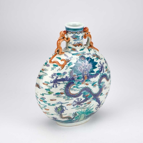 917 - A CHINESE DOUCAI 'DRAGON' MOON FLASK, BIANHU with chilong handles to the neck, enamel painted front ... 