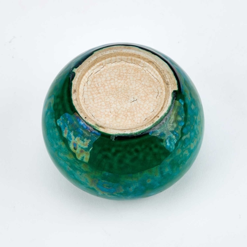 928 - A CHINESE GREEN-GLAZED BRUSH WASHER the squat body covered in a lustrous green glaze. 5.5cm high... 