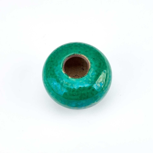 928 - A CHINESE GREEN-GLAZED BRUSH WASHER the squat body covered in a lustrous green glaze. 5.5cm high... 