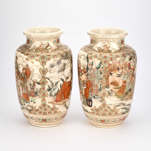 945 - A LARGE PAIR OF JAPANESE SATSUMA VASES, EARLY 20TH CENTURY of shouldered ovoid form, each painted wi... 