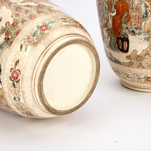 945 - A LARGE PAIR OF JAPANESE SATSUMA VASES, EARLY 20TH CENTURY of shouldered ovoid form, each painted wi... 